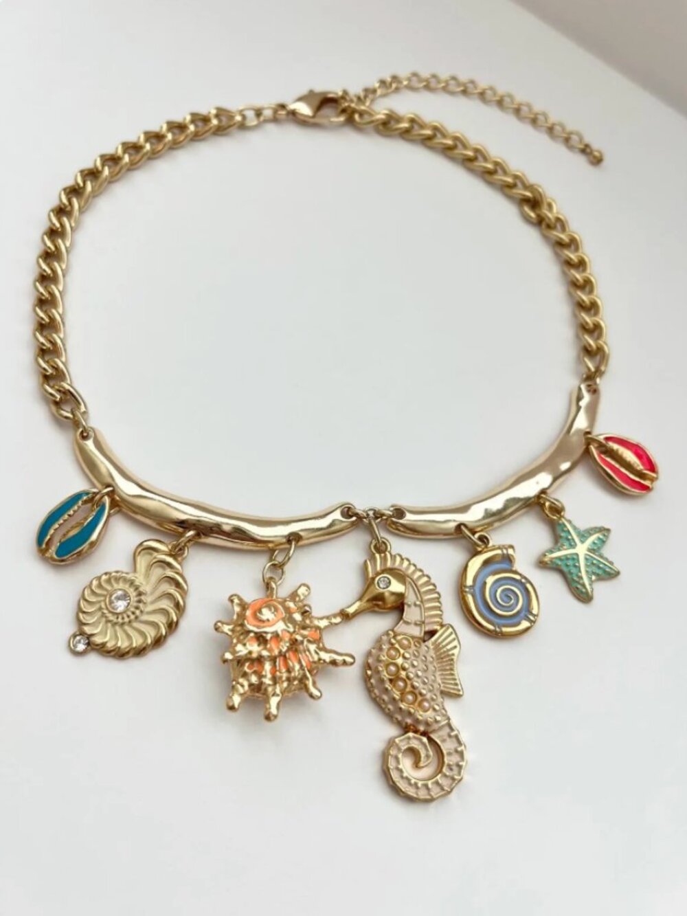 Gold Ocean Charm Statement Necklace